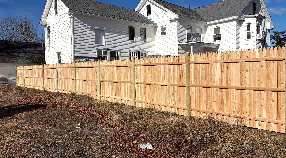Wood Fencing — Custom wood fencing built with premium materials and expert craftsmanship for timeless curb appeal.